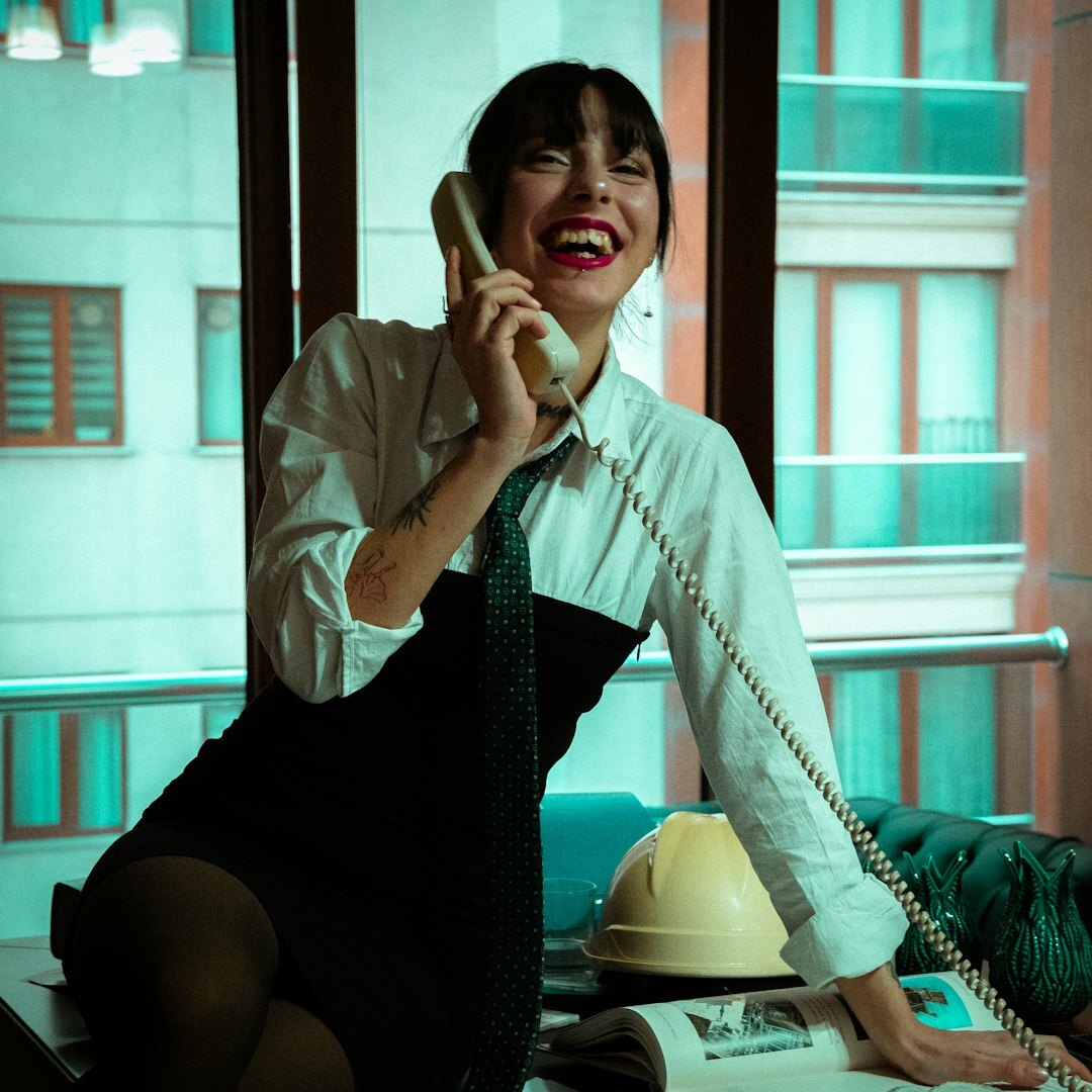 Portrait of a female floor manager with headset