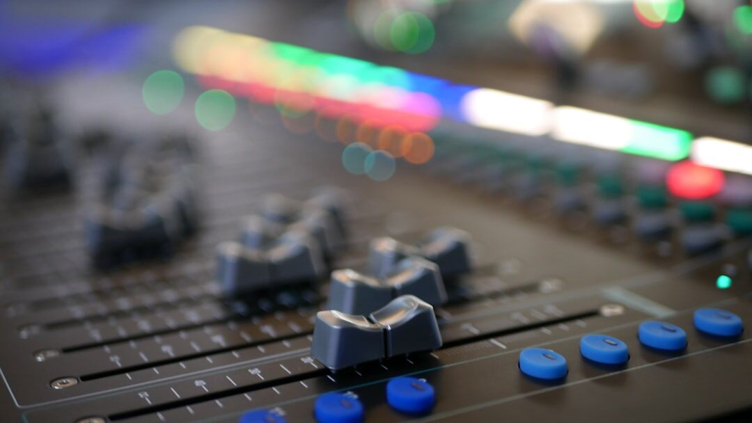 Audio mixing console with sound faders